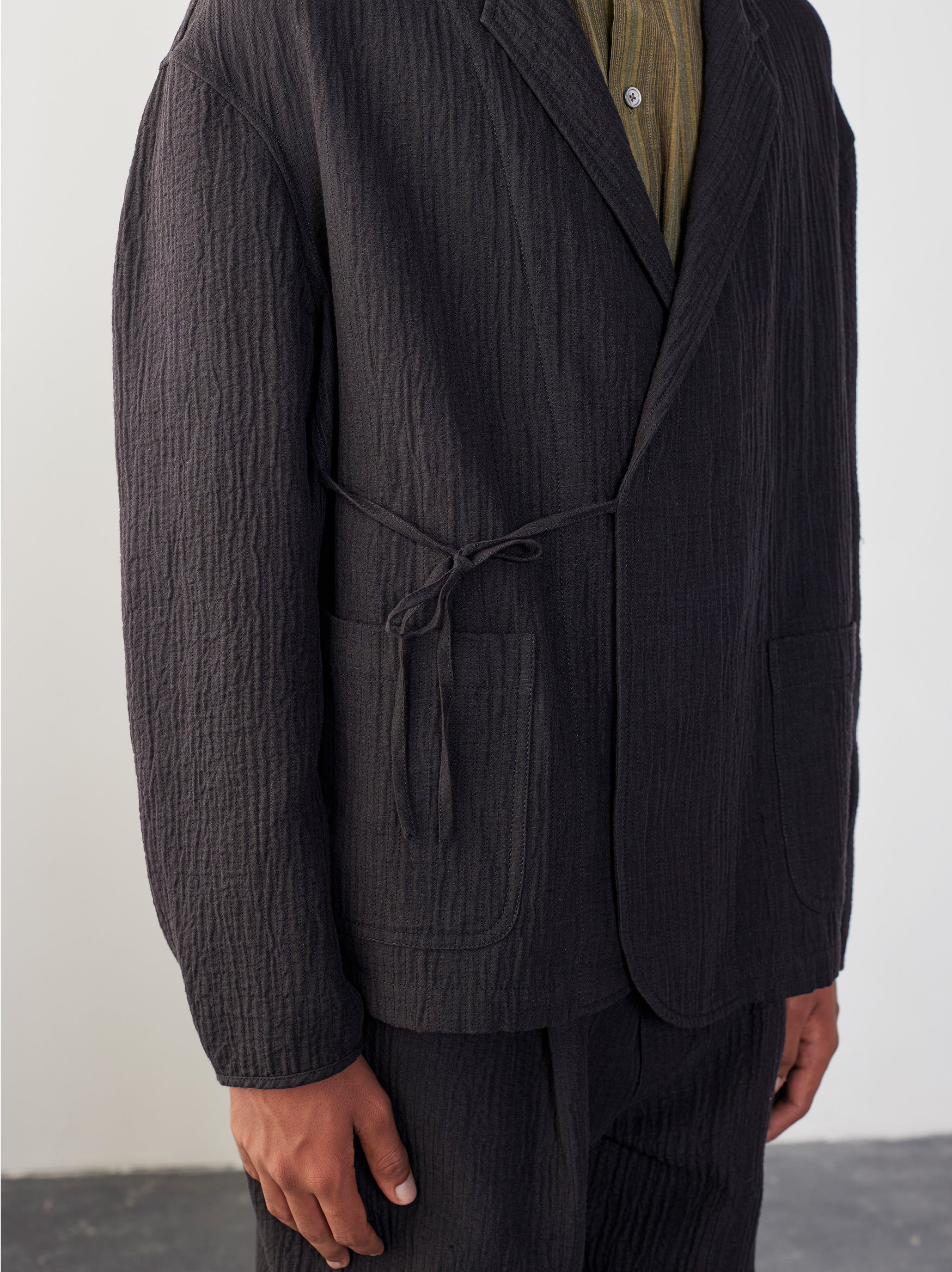 IT.EXC.23.26 OVERDYED PADDED WRAP JACKET